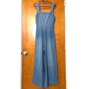 madewell denim apron bow-back jumpsuit